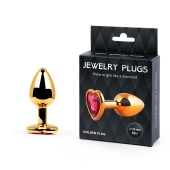 Золотистая анальная пробка с малиновым кристаллом-сердечком - 7 см. - Anal Jewelry Plug - купить с доставкой в Пушкино